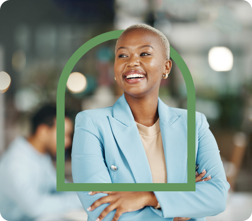 Image of a female business owner in a green frame, smiling thanks to Millbrook's partner finance solutions