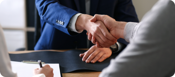 Image of Millbrook Finance Partners shaking hands