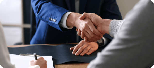 Image of Millbrook Finance Partners shaking hands