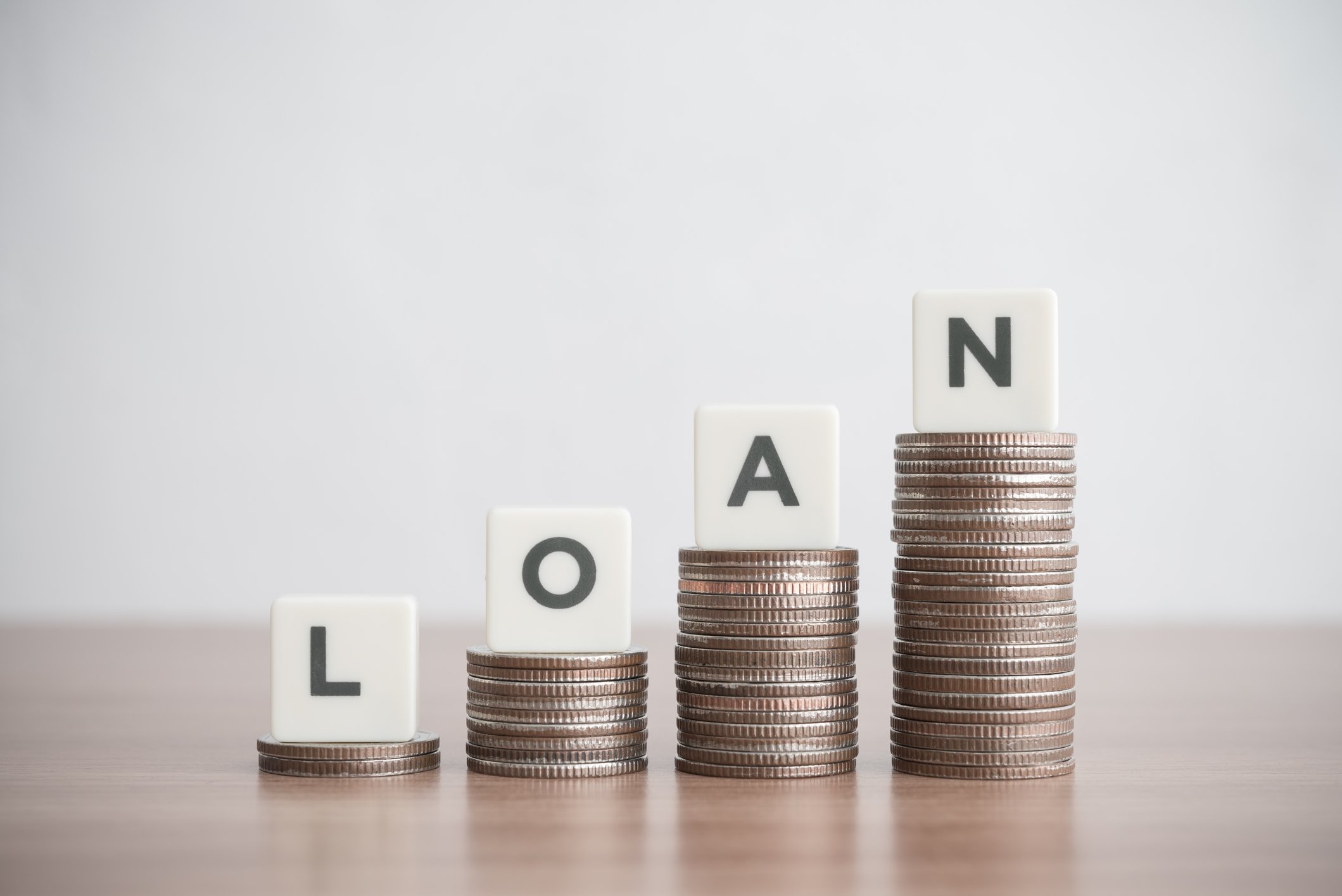 Coins stacked up | What is an unsecured business loan?
